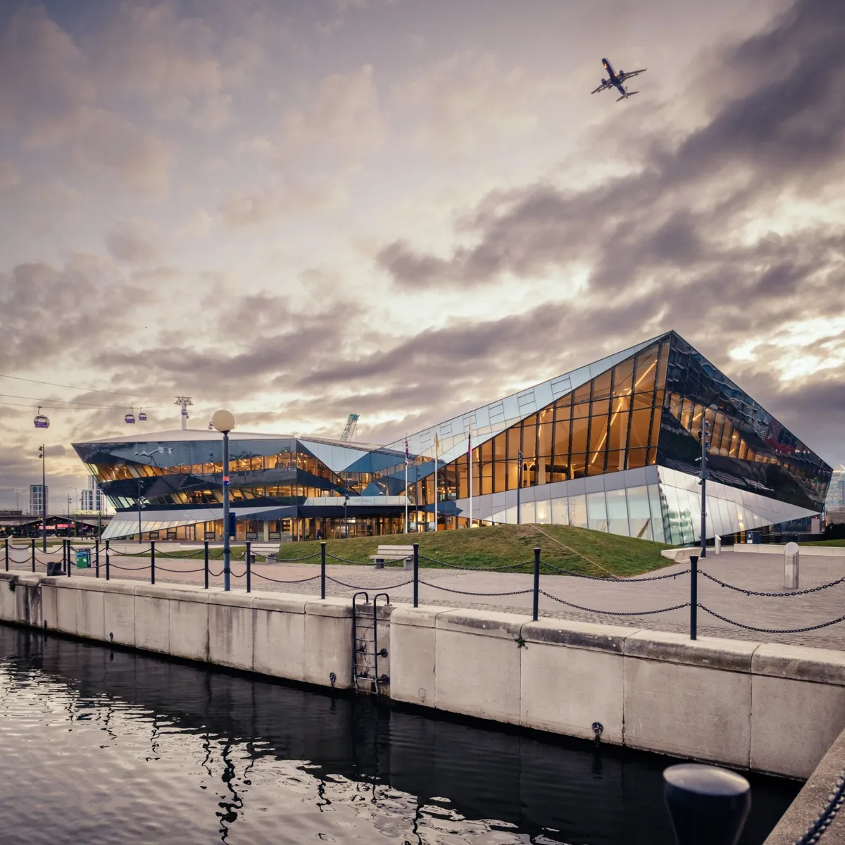 City Hall at dusk, seen from across the Royal Victoria Dock